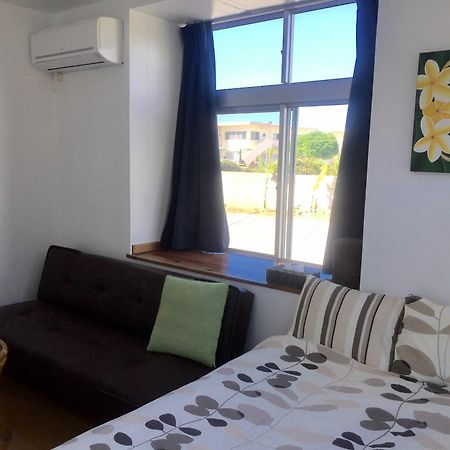 Guesthouse Seagull Village Мотобу Экстерьер фото